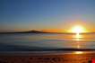 the-dawn-of-a-new-day-as-the-sun-rises-beside-rangitoto-island-The Dawn Of A New Day As The Sun Rises Beside Rangitoto Island