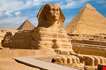 Great Sphinx Including The Pyramids Of Menkaure And Khafre In The Background In Giza Cairo Egypt-Great Sphinx Including The Pyramids Of Menkaure And Khafre In The Background In Giza Cairo Egypt