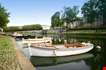 Row Of Boats Moored In A City Lake Of Nantes France-Row Of Boats Moored In A City Lake Of Nantes France